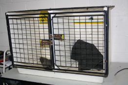 A LINTRAN DOG TRANSIT BOX constructed of fibreglass and steel mesh with 2 doors 104cm wide 67cm deep