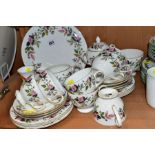WEDGWOOD 'HATHAWAY ROSE', R4317, comprising cake plate, milk jug, covered twin handled sugar bowl,