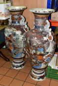 A PAIR OF LARGE FLOORSTANDING BALUSTER SHAPED SATSUMA VASES, polychrome enamel decoration