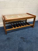 A TEAK TILE TOP COFFEE TABLE