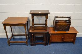 A QUANTITY OF OAK OCCASIONAL FURNITURE, to include a low two door cupboard, nest of three tables,