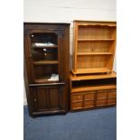 AN OAK GLAZED CORNER CUPBOARD, together with a modern pine open bookcase and a Nathan teak two