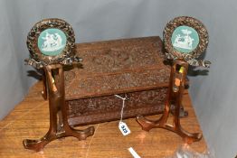 A PAIR OF COPPER ART NOUVEAU FIRE DOGS, with green Jasper style plaques inset into a Laurel Wreath