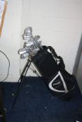 A DUNLOP GOLF BAG containing Dunlop and Donnay golf clubs