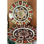 A PAIR OF ROYAL CROWN DERBY 1128 IMARI PATTERN 27CM DINNER PLATES, both marked as seconds, both with