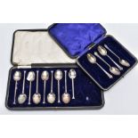 TWO CASED, INCOMPLETE SETS OF TEASPOONS, the first a black rectangular case holding eight plain