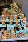 A COLLECTION OF PENDELFIN RABBITS AND STAND, mostly boxed except where mentioned, comprising '