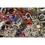 A LARGE BOX OF COSTUME JEWELLERY, to include bangles, bracelets, beaded necklaces, rings,