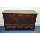 A GEOGRGIAN OAK MULE CHEST, four fielded panels to the front, above three various drawers, width