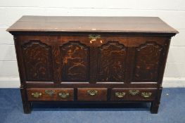 A GEOGRGIAN OAK MULE CHEST, four fielded panels to the front, above three various drawers, width