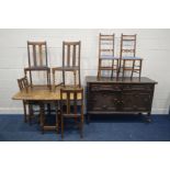 AN OAK BARLEY TWIST GATE LEG TABLE (sd) and four matching chairs, along with an oak geometric