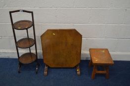 AN OAK FOLDING THREE TIER CAKE STAND, along with a folding occasional table and a stool (3)