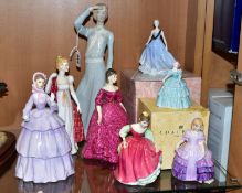 EIGHT VARIOUS FIGURINES, comprising three Royal Doulton 'Panorama' HN3028 (Reflections), height 31.