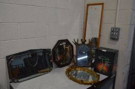 A NEW AND BOXED BANKERS LAMP, together with six various wall mirrors, including a resin antler style