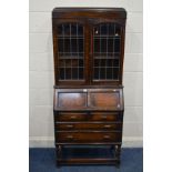 AN EARLY 20TH CENTURY OAK BUREAU BOOKCASE, width 77cm x depth 41cm x height 177cm