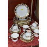 A ROYAL CROWN DERBY 'DERBY BORDER' PATTERN PART DINNER SERVICE, comprising six tea cups, six saucers