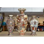 A PAIR OF JAPANESE SATSUMA BALUSTER SHAPED VASES WITH TWIN HANDLES, polychrome decoration