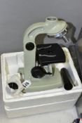 A RUSSIAN MADE MONOCULAR MICROSCOPE, marked YM-301 N8807 Production de L'URSS, appears complete with
