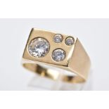 A 9CT GOLD, CUBIC ZIRCONIA SET SIGNET RING, of a rectangular form set with four graduated circular