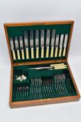 A COMPLETE CANTEEN OF CUTLERY, a light wooden canteen containing a forty eight piece set includes