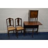 A VICTORIAN WALNUT SUTHERLAND TABLE, sewing box and two cane seated chairs (4)