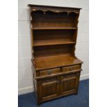 AN OLD CHARM OAK LINENFOLD DRESSER, with two drawers, width 93cm x depth 44cm x height 176cm