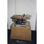 A CLARKE 10 INCH TABLE SAW mounted to a bespoke plywood stand (PAT pass and working) blade guard