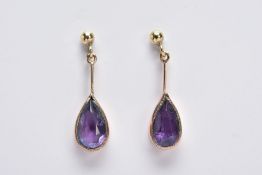 A PAIR OF 9CT GOLD AMETHYST DROP EARRINGS, each designed with a pear cut amethyst within a collet