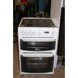 A CANNON CARRICK GAS COOKER with electronic ignition four ring hob, grill and oven (PAT pass and