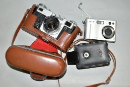A RUSSIAN KIEV RANGEFINDE CAMERA, complete with 53mm f2 interchangable lens and leather case,