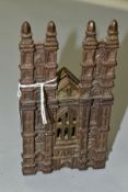 A CAST IRON MONEY BOX, in the form of a twin towered Gothic Cathedral , marked bank to front, flat V