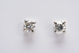 A MODERN PAIR OF 18CT WHITE GOLD DIAMOND STUD EARRINGS, estimated total modern round brilliant cut