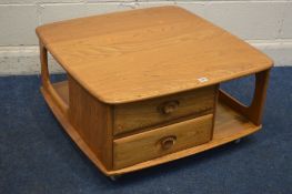 AN ERCOL MODEL 735 BLONDE ELM PANDORA BOX OCCASIONAL TABLE, with two drawers and book storage, on