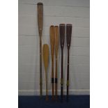 A COLLECTION OF VINTAGE WOODEN OARS, to include two pairs, longest length 284cm (one pair with