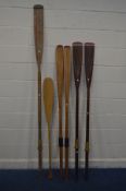 A COLLECTION OF VINTAGE WOODEN OARS, to include two pairs, longest length 284cm (one pair with