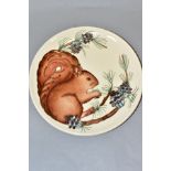 A MOORCROFT POTTERY LIMITED EDITION YEAR PLATE 1995, Squirrel design 132/500, impressed backstamp