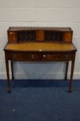 A REPRODUCTION MAHOGANY LADIES DESK, with a tan leather inlay, two frieze drawers, on square