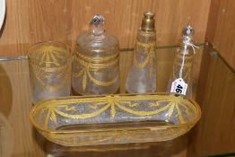 A ST LOUIS CRYSTAL DRESSING TABLE SET, comprising a scent bottle, powder pot with lid, tumbler,