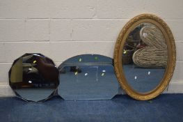 AN OVAL GILTWOOD FRAMED BEVELLED EDGE WALL MIRROR, along with three other wall mirrors (4)