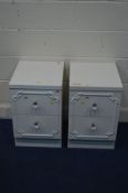 A PAIR OF WHITE FINISH FRENCH TWO DRAWER BEDSIDE CABINETS