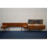 AN AUSTINSUITE TEAK DRESSING TABLE, with a large rectangular mirror, above six drawers, width