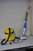 A KARCHER A2004 VACUUM CLEANER (taped pipe and no floor attachment) and a Vax Steam Hard Floor