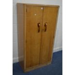 A GOLDEN OAK TWO DOOR GENTLEMANS WARDROBE, width 80cm x depth 47cm x height 153cm (key)