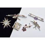 A COLLECTION OF SIX ASSORTED WHITE METAL BROOCHES, to include an early 20th century paste set