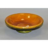 CHRISTOPHER DRESSER (SCOTTISH 1834-1904) FOR LINTHORPE POTTERY, a footed bowl, brown and green