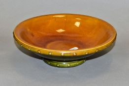 CHRISTOPHER DRESSER (SCOTTISH 1834-1904) FOR LINTHORPE POTTERY, a footed bowl, brown and green
