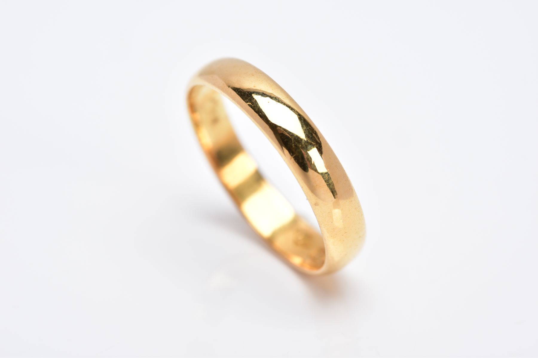 A 22CT GOLD WEDDING BAND, of a plain polished design, approximate width 4.2mm, hallmarked 22ct - Image 3 of 3