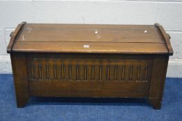 AN OAK BLANKET CHEST, with lunette carved front, width 105cm x depth 44cm x height 49cm