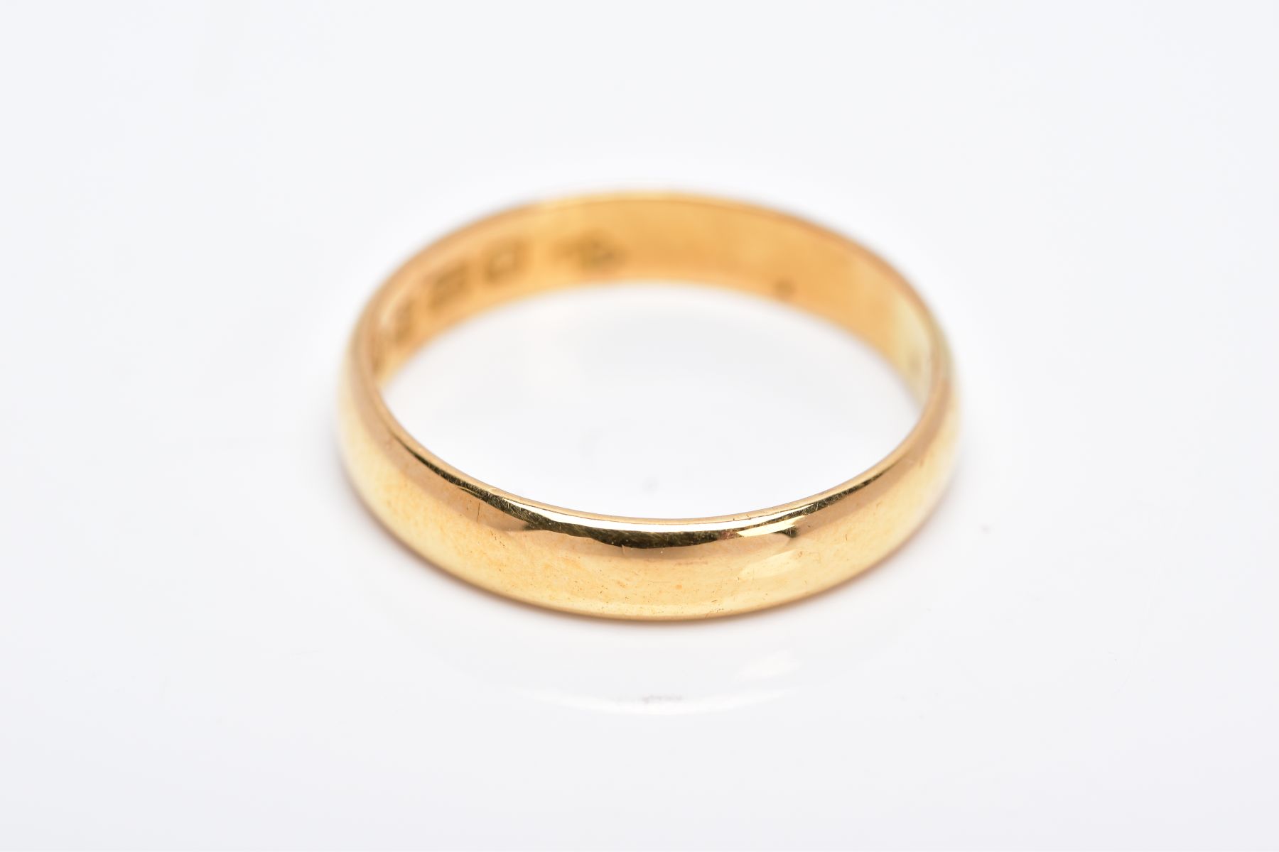 A 22CT GOLD WEDDING BAND, of a plain polished design, approximate width 4.2mm, hallmarked 22ct - Image 2 of 3