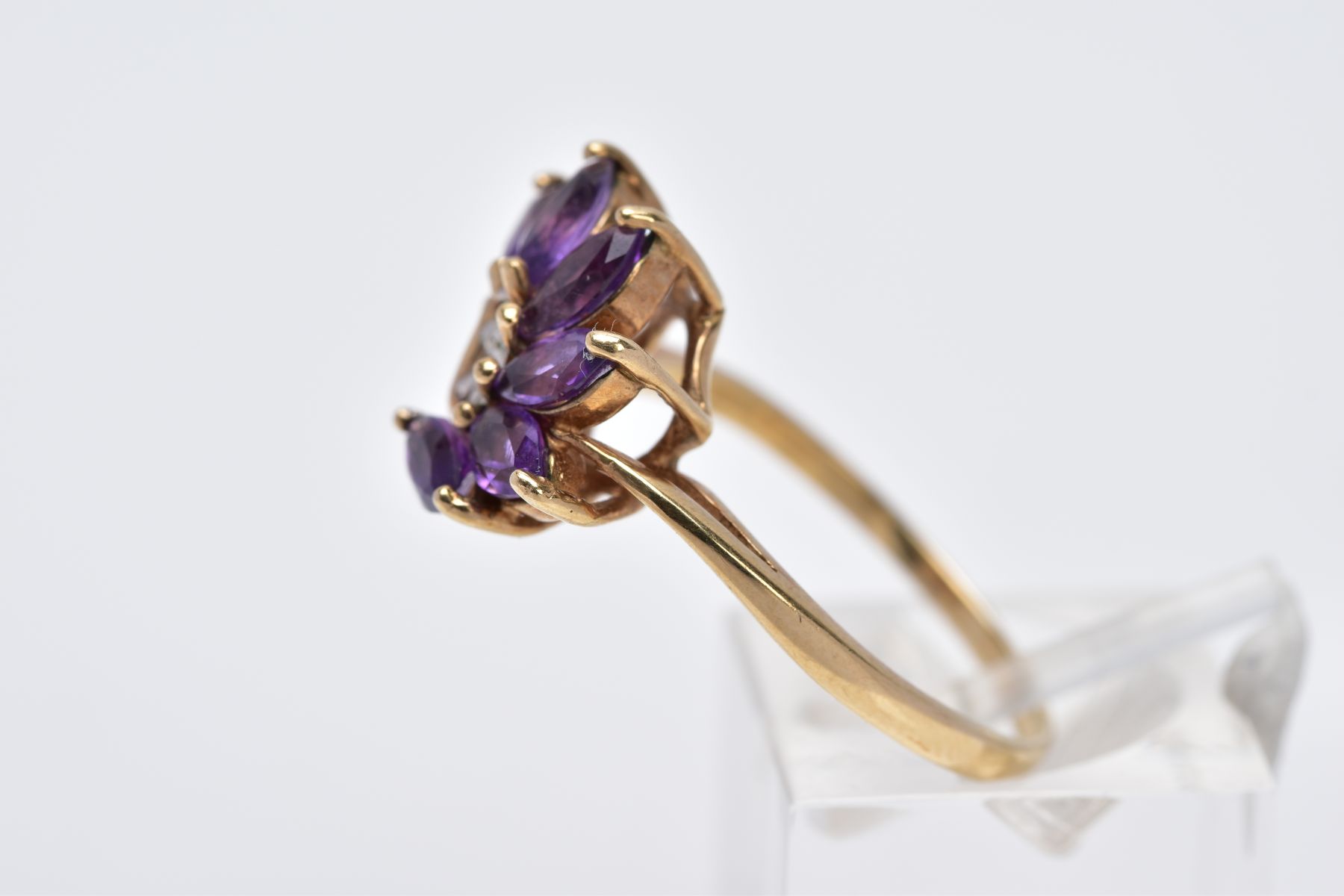 A 9CT GOLD AMETHYST RING, designed as a spray of marquise cut amethyst with a single cut diamond - Image 2 of 4